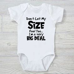 Don't let my Size Fool You Onesie This adorable onesie  makes an excellent gift. All our Bodysuits / Onesies are high quality 100% cotton Gerber. We are professional printers and print every item the NEXT DAY so you no longer do you have to wait weeks for an item. We ship FIRST CLASS USPS. The design is printed on the front of the onesie. OUR GUARANTEE: 14 day return for any reason! Just return the item and we will re-print or Return your $$  Onesies sizes:  Newborn/ 0-3 month/ 3-6 month/ 6-9 month/ 12 month/ 18 month/ 24 month Some people say Gerber runs small so you may wish to order 1 size larger  WE HAVE A 100% POSITIVE FEEDBACK!!!! Any questions? Please email us. We also offer Custom Printed Onesies and Tee Shirts with your Text or Pictures ( or Both ) Please check out our other aucti Newborn Baby Onesie Ideas, Baby Onsies Ideas Funny, Funny Newborn Onesies, Baby Onesies For Boys, Soccer Centerpieces, Baby Sayings, Funny Baby Bibs, Boy Onesies, Funny Baby Onesie