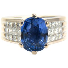 Raised Cushioned Princess & Grill Patina GIA Certified 4.52ct. Natural Blue Sapphire ring GIA Certified Report ID: 5161111589 11.16 X 5.69 X 5.07mm Full cut cushion brilliant Clean Clarity & Transparent Cornflower prime. 1.00ct. Diamonds. Princess Full cuts G-color Vs-2 clarity. Platinum 22.7 grams Ring Current size: 7 Resize Service available, Please inquire Ring: .51 inch wide Depth: .37 inch $38,000 Appraisal Certificate to accompany Cornflower Blue Sapphire, Blue Sapphire Diamond Ring, Blue Sapphire Ring, Blue Sapphire Diamond, Diamonds Ring, Sapphire Diamond Ring, Bling Rings, Blue Sapphire Rings, Natural Blue Sapphire