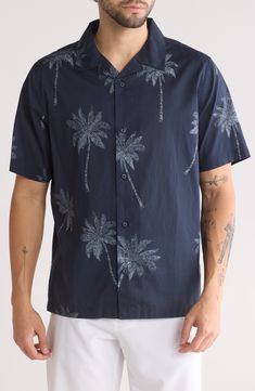 Breezy palm trees invite warm-weather vibes in this button-up shirt crafted from lightweight and breathable blended cotton. Front button closure Notched collar Short sleeves 55% lyocell, 45% cotton Machine wash, tumble dry Imported Collared Hawaiian Shirt With Palm Tree Print For Summer, Summer Collared Hawaiian Shirt With Palm Tree Print, Casual Shirt With Palm Tree Print And Camp Collar, Collared Camp Shirt With Palm Tree Print For Summer, Summer Camp Shirt With Palm Tree Print And Collar, Summer Collared Camp Shirt With Palm Tree Print, Summer Cotton Camp Shirt With Palm Tree Print, Relaxed Fit Hawaiian Tops With Palm Tree Print, Hawaiian Button-up Tops With Palm Tree Print