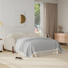 a bedroom with a white bed and beige curtains