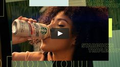 a woman drinking starbucks coffee from a can