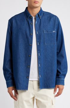 This timeless button-down shirt is made from washed organic-cotton denim and finished with a patch pocket. Front button closure Button-down collar Long sleeves with button cuffs Chest patch pocket 100% organic cotton Machine wash, line dry Imported