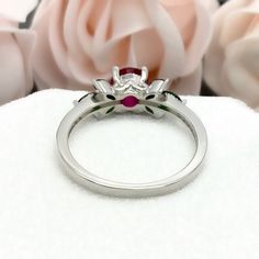 This beautiful ring is made from genuine 925 sterling silver with rhodium plating. Ring details- -The Main stone is a round cut 6mm Lab Created Ruby Stone -Side stones are 4mm by 2mm Lab Emerald Marquise and 1mm Round simulated diamonds -Ring is casted in solid 925 sterling silver with rhodium plating (yellow gold and rose gold plated also available, please check the drop down menu for more options) -The Total face height of the ring measures 7mms and the band width measures 1.5mms -Each ring is Silver Emerald Open Ring For Promise, Silver Emerald Open Ring With Center Stone, Silver Emerald Ring With Center Stone, Open Ring Style, White Gold Gemstone Promise Ring, Silver Open Ring Ruby With Diamond Accents, Silver Ruby Ring With Center Stone In Sterling Silver, Silver Open Ruby Ring With Diamonds, Silver Open Ring With Diamond And Ruby, Silver Ruby Ring With Center Stone