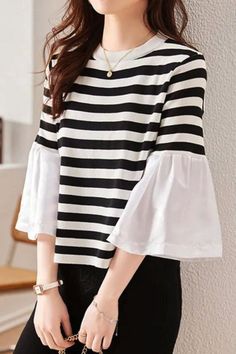 This long-sleeve top features flared sleeves and a pleated, split-joint design for a unique look. The striped pattern and round neckline add a classic touch, making it a stylish and versatile choice for casual outfits with a touch of elegance. Casual Cotton Blouse With Striped Sleeves, White Short Sleeve Top With Striped Sleeves, White Crew Neck Top With Striped Sleeves, White Crew Neck T-shirt With Striped Sleeves, Fitted Top With Striped Sleeves, Casual Tops With Striped Short Sleeves, Casual Short Sleeve Tops With Striped Sleeves, Black Crew Neck Top With Striped Sleeves, Spring Tops With Striped Short Sleeves