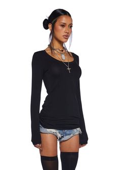 Get coffee wearing this long sleeve top that has a scoop neckline, long sleeves, and a relaxed fit. Fall Long Sleeve Top For Layering With Scoop Neck, Fall Long Sleeve Scoop Neck Top For Layering, Black Long Sleeve Top With Thumbholes For Fall, Black Long Sleeve Top With Thumbholes For Layering, Black Tops With Thumbholes For Fall, Scoop Neck Tops For Night Out In Fall, Fall Scoop Neck Top For Night Out, Black Long Sleeve Top With Thumbholes For Spring, Casual Black Long Sleeve Top With Thumbholes