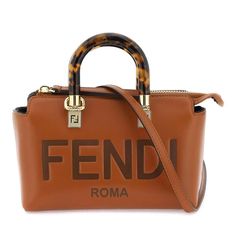 Fendi By The Way Mini Shoulder Bag Is Crafted From Smooth Brown Calfskin Leather. - Detachable Adjustable Leather Shoulder Strap - Zip Fastening - Tortoiseshell-Effect Plexiglass Handles - Golden Hardware - Measurements: 3.5"L X 8"W X 4.7"H - Made In Italy - Comes With A Dust Bag. - Designer Sku Number: 8bs067abvl - Designer Color: F0pwz Modecraze Is An Online Platform That Offers The Best Designer Products From Europe To Customers All Over The World. Our Exclusive Partnerships With European Ret Fendi By The Way Mini, Fendi Pouch, Fendi Crossbody Bag, Fendi By The Way, Smartphone Bag, Canvas Leather Tote Bag, Leather Coat Womens, Fendi Handbag, Fendi Handbags