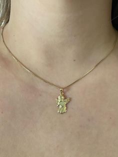 14k solid yellow gold Angel praying pendant.Material: Real 14k solid gold.Length: Approximately 3/4 of an inch long.Width: Approximately 1/2 an inch wide.Weight: Approximately 1.5 grams of gold.Comes in a nice box.*Chain Sold Separately at check out.  Chain typically comes in 1-2 grams. Spiritual 14k Gold Jewelry Stamped 14k, Fine Jewelry Charm Necklace In Yellow Gold, Fine Jewelry Yellow Gold Charm Necklace, Yellow Gold Hallmarked Charm Necklace, Fine Jewelry, Hallmarked Yellow Gold Charm Necklace, 14k Yellow Gold Tarnish Resistant Charm Necklace, Tarnish Resistant Yellow Gold Charm Pendant Necklace, Tarnish Resistant Yellow Gold Pendant Charm Necklace, Fine Jewelry 14k Gold Stamped Charm Necklaces