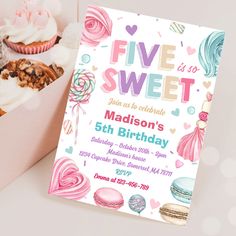 a pink box filled with cupcakes next to a card that says five is sweet