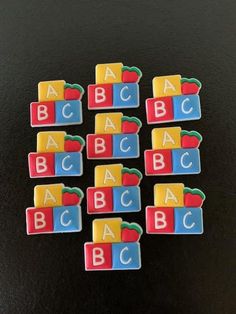 the letters and numbers are made out of magnets that spell out abc, c, person