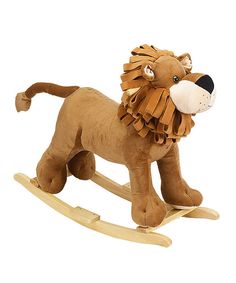 a stuffed lion on a wooden rocking toy