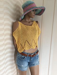 If you need something to just cover your shoulders, armpits and chest this  yellow fishnet crop sweater will be there. Also can be used to cover a bikini top on the beach. I made it using quality cotton yarn. It's loosely knitted, and secured under the armpits so it's steady and doesn't rise or swing around. Measurements: width: 25' = 64cm lenght: 11' = 28cm The length can be longer or shorter as you wish it to be. Just convo me the length you require . This item is ready to ship and will be shipped out with in 4-5 days of receipt of payment. Friday night orders are sent monday morning.   Your purchased item will be delivered in 5-7 days everwhere of the world. For other stunning styles of mrlworks please try below link  https://www.etsy.com/shop/Mrlworks?ref=seller-platform-mcnav Thank yo Open Knit Tops For Summer Beach Cover-up, Summer Stretch Crochet Top For Beach Season, Trendy Crochet Tops For Beach Season, Casual Yellow Crochet Top For Summer, Stretch Crochet Top For Summer Beachwear, Trendy Open Knit Beach Top, Knit Tops For Summer Beachwear, Cotton Crochet Top For Beach Season, Knit Tops For Beach Season