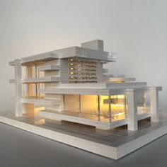 a model of a house with lights on