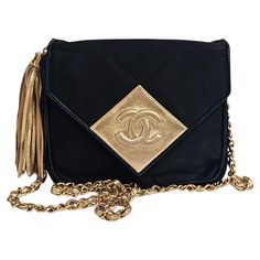 Beautiful vintage mini bag in black satin with gold detailing. Overall in good vintage condition still. Series #1. Comes as is with the holo intact. Minor marks on the satin surface. Handbag Aesthetic, Dior New Look, Sportswear Store, Gucci Runway, Satin Quilt, Vintage Chanel Bag, Chanel Jumbo, Satin Noir, Chanel Vintage