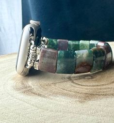 Apple watch stretchy band, Series 5/67/8. Genuine Amethyst/Jade carved rectangle beads.  Material: Genuine Amethyst, Jade. Stainless Steel  Length: 5.5 - 8.5 inches Stretch Band, Stretch Bands, Tiger Eye, 9 And 10, Watch Bands, Apple Watch, Rose Quartz, Jade, Amethyst