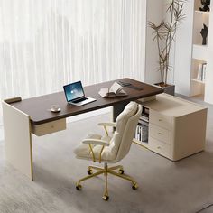 an office desk with a laptop computer on it and a chair in front of it