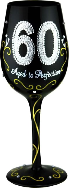 a black wine glass with the number sixty on it's side and an ornate design