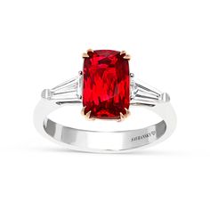 Elongated Red Spinel Three Stone Ring - With Diamond Baguettes 
Bring sparkle and sophistication to any look with this classic yet unique Elongated Red Spinel Ring. This majestic three-stone style features a trio of glistening gemstones and diamonds - the largest being an elongated red spinel center stone set in 18K rose gold double cat claw prongs with two kite-shaped diamond side stones flowing seamlessly into an 18K white gold band. Surprise your loved one with this exclusive, Red Diamond Ring With Baguette Cut, Luxury Three Stone Ruby Ring, Luxury Red Cushion Cut Ruby Ring, Formal Red Ruby Ring With Three Stones, Formal Ruby Three Stone Ring, Formal Red Three Stone Ruby Ring, Luxury Ruby Three Stone Rings, Classic Red Three Stone Diamond Ring, Luxury Red Three Stone Jewelry