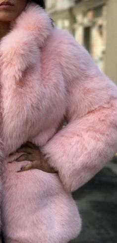 STUNNING PINK BABY ALPACA FUR COAT Styled and glamorous Baby Alpaca fur coat handmade by Peruvian artisans, handmade of 100% baby alpaca fur. Value for money is what every buyer seeks to achieve when buying any item. In the recent past, fur coats have gained popularity, and everyone wants to have as many of these as they can afford. Indeed, the coats are luxurious and investment because of many reasons. Size available : S - M - L - XL - XXL Material: 100% baby Alpaca fur. Garment Type: fur coat Spring Fluffy Faux Fur Coat, Chic Fluffy Fur Coat, Chic Fluffy Fur Coat For Spring, Winter Pink Fluffy Fur Coat, Solid Color Faux Fur Coat For Winter, Winter Faux Fur Coat With Feather Trim, Pink Winter Outerwear With Feather Trim, Pink Faux Fur Outerwear With Fur Trim, Pink Fluffy Long Sleeve Fur Coat