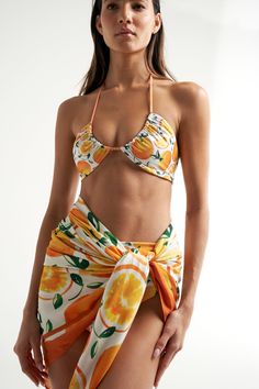 The SIGAL oversized printed sarong in deliciously soft and flowy. Made of 100% Ecological Viscose. It is the ultimate swimwear cove up. Perfect for traveling, our sarongs take very little luggage space. They are the most versatile pieces you'll have in your wardrobe, can be tied in many different ways, as chic cover ups, dresses, skirts and a scarf. Featuring a hand painted print by SIGAL herself and accented with stripes on the edges, this accessory provides endless possibilities to freshen up Tropical Printed Sarong For Vacation, Printed Sarong For Poolside And Beach Season, Beachy Printed Sarong For Pool, Hawaiian Printed Sarong For Vacation, Hawaiian Printed Sarong For Poolside, Beachy Printed Sarong For Beach Party, Printed Sarong For Beach Cover-up Vacation, Printed Vacation Sarong, Printed Sarong For Pool And Vacation