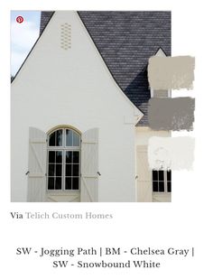 a white house with black shutters and gray shingles on the roof, in front of a sky background