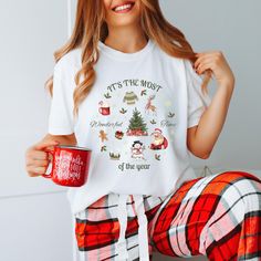 Get into the holiday spirit with our "It's the Most Wonderful Time of the Year" shirt! Perfect for moms and matching family Christmas pajama sets, this festive tee is ideal for Christmas parties, gift exchanges, or cozy nights by the fire. Made from soft, comfortable fabric, it features a cheerful design that captures the joy of the season. Gift it to her or wear it to celebrate the magic of Christmas together with loved ones! Please note that due to the custom nature of each t-shirt, we do not Christmas Pj, Matching Family Christmas Pajamas, Christmas Gift For Her, Wonderful Time Of The Year, Christmas T Shirt, Pajama Shirt, Christmas Pajamas, Christmas Gifts For Her, Christmas Tshirts