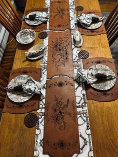 Make a Beautiful Equestrian, Rustic or Classy but Definitely Unique statement with a Heavy leather table Runner. designed to fit many table lengths. It comes with a three-piece 72" puzzle-like runner and can be made to infinite lengths by adding more pieces. Check out my matching places mats. This Rustic Runner is made with a floral pattern and will coordinate with different styles from Equestrian to Rustic,  Western, Country to Boho styles. Linens shown here are also available in my shop along Table Decor Rustic, Holiday Table Decor, Leather Table, Floral Table Runner, Holiday Table Decorations, Floral Table, Western Homes, Leather Floral, Western Home Decor