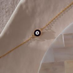 "14k Solid Gold Navy Blue Evil Eye Bracelet, Protection Bracelet ★ ★ ★Description★ ★ ★ ✓ Material: 14k Real Solid Gold ✓ Available Gold Colors: Yellow Gold, White Gold and Rose Gold ✓ Available Chain Sizes: 5\", 5.5\", 6\", 6.5\" , 7\" and extra 1\" inch Extender for all Chains ✓ Charm/Pendant Material: Highest Quality Glass ✓ Charm/Pendant Diameter: 0.24\" ✓ Ready to Ship in 3-4 Business Days ✓ International ★FREE★ Express Shipping ★ ★ Each order will be packed in a beautiful gift box★ ★ 🎁 PER Modern 14k Gold Filled Bracelets As A Gift, Elegant Blue Chain Bracelet For Everyday, Everyday Blue Tarnish-resistant Jewelry, Minimalist Blue Bracelets, Minimalist 14k Gold Evil Eye Bracelet, Elegant Blue Bracelets With Delicate Chain, Modern Blue Bracelet For Gift, Blue 14k Gold Everyday Bracelets, Elegant Blue Bracelet With Delicate Chain