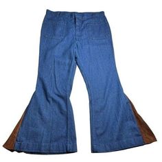 One of a kind modified vintage 1970s sailor Seafarer Utility Trousers Jeans in bright blue lightweight denim (possibly chambray-style, not thick/stiff) that have been modified into bellbottoms with a brown velvety "suede"-feel v-panel. Super high-waisted with zip and hook closure; front and back pockets. Standout OOAK/bespoke statement piece to add to the grooviest of retro hippie festival closets.  Seafarer 65% Cotton | 35% Polyester Estimated size M/L (No tag and have been modified - please review measurements in photos)  *SHORT INSEAM  Approximate flat-lay measurements:  Waist: 17.5" Rise: 13.5" Inseam: 26" Leg-Opening: 14"  Minor signs of wear; no major flaws.  Vintage items are preloved and may display signs of wear as consistent with age and use. Please refer to images as most accura Retro Cotton Bottoms For Fall, Vintage Cotton Flare Jeans For Fall, Vintage Style Cotton Flare Jeans For Fall, Retro Flare Denim Pants, Vintage Light Wash Bottoms For Fall, Retro Flare Bottoms In Medium Wash, Retro Flare Denim Bottoms, Retro Flare Cotton Jeans, Retro Medium Wash Flare Bottoms