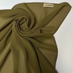 "Everyday chiffon hijab, statement hijab, airy fabric that's suitable for casual, formal and professional look. Our quality premium chiffon is light, breathable and versatile for all occasions. ✨ Sizes 180cm x 80cm / 71\" x 31\" ✨ The best material that we are proud to wear ourselves. ✨ Slightly sheer but opaque when wrapped and folded. ✨ For an effortless, minimalist looking that will go with everything! ✨ It's easy to care for, durable, non fading and naturally wrinkle- resistant material  ✨ The crisp, matte finish creates a polished look without added bulk and effortlessly stylish  ✨ Due to the smooth feel, wear it with underscarf and pins for added comfort For other chiffon hijab colours, find it here https://www.etsy.com/ca/listing/1008854291/180x80cm-premium-chiffon-hijab-maxi Colour Solid Color Chiffon Hijab In Modest Style, Solid Chiffon Hijab Modest Style, Modest Solid Color Chiffon Hijab, Elegant Solid Color Chiffon Hijab, Elegant Chiffon Headscarf For Eid, Elegant Solid Chiffon Hijab, Chiffon Hijab Colours, Jersey Hijab Scarfs, White Hijab