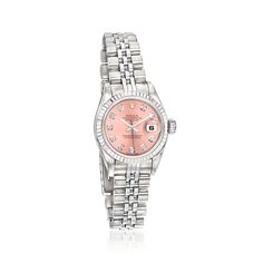 Pre-Owned Rolex Datejust Women's 26mm Automatic Stainless Steel, 18kt White Gold Watch. C. 2004. Experience the renowned luxury of a pre-owned Rolex with this Datejust women's watch. The timepiece features Swiss automatic movement, synthetic sapphire crystal, 26mm case, pink dial with diamond markers, 18kt white gold bezel, and stainless steel crown and jubilee bracelet with a foldover clasp. Water-resistant up to 100M. Pre-owned Rolex stainless steel and 18kt white gold watch. Ross-Simons is not an authorized Rolex dealer. Watches from our Pre-Owned collection are inspected by our watchmakers for authenticity. They also undergo complete movement service as needed, water resistance testing and refurbishing of case and bracelet. All of our Pre-Owned watches are covered by Ross-Simons with a Rolex Datejust Women, White Gold Watch, Steel Crown, Fine Jewelery, Pre Owned Rolex, Women's Watch, Rolex Datejust, Sapphire Crystal, Gold Watch