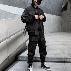 Introducing the Black Techwear Cargo Pants, the perfect blend of high-tech style and practicality. Designed with a modern aesthetic, these Tactical Cargo Pants are durable and multifunctional, giving you the utmost confidence wherever your expedition takes you. Crafted from tough synthetic materials that are both moisture-wicking and breathable, they can keep up with any outdoor activity. Their functional goodies–like pockets on the sides, bellowed cargo pockets at the thigh and shin level, plus Cargo For Men, Black Techwear, Hiphop Streetwear, Techwear Pants, Tactical Cargo Pants, Tech Fashion, Tech Fleece, Black Joggers, Synthetic Materials