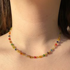 "Beautiful Handmade multicoloured iridescent seed bead rosary chain style necklace❤️   This necklace can come in a variety for sizes all with a 2 inch extendable chain for example if you chose the 14\" option it will adjust to 16\" (worn at 16\" and 18\" in photos) and the necklace is made with a tarnish resistant gold plated wire and stainless steel clasp PACKAGING  This will come in a little organza gift bag so make the perfect present!  CARE OF ITEM Avoid contact with water/liquids as this ma Adjustable Rainbow Crystal Necklace With Faceted Beads, Rainbow Jewelry With Beaded Round Beads, Rainbow Beaded Chain Jewelry With Round Beads, Adjustable Rainbow Necklaces With Polished Beads, Adjustable Rainbow Polished Beads Necklace, Rainbow Jewelry With Round Beaded Chain, Dainty Beaded Chain Necklace For Festival, Dainty Multicolor Necklace For Jewelry Making, Rainbow Necklaces With Spacer Beads For Jewelry Making