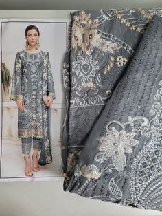 Gorgeous new design, trendy and perfect for weddings! Pakistani and Indian style. lovely grey colour  gorgeous thread embroidery, sequins and stonework material only so you may sew and tailor tk your own measurements Gray Resham Embroidery Kurta For Wedding, Gray Anarkali Set With Dupatta, Silver Semi-stitched Dress With Dabka Work, Gray Festive Sets With Resham Embroidery, Festive Embroidered Gray Sets, Festive Gray Sets For Eid, Elegant Gray Kurta With Resham Embroidery, Festive Unstitched Gray Kurta, Silver Salwar Kameez With Resham Embroidery For Eid