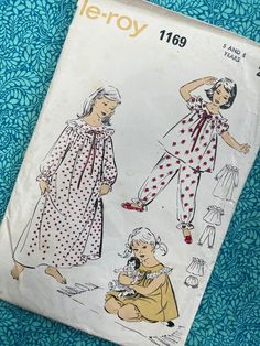 Undated pattern from Le-Roy creates a girls long nighdress with long sleeves, pyjamas with long or short trousers, may be made with short sleeves or sleeveless. Size 5 and 6 Chest 24 inches Waist 24 inches Hips 26 inches Unprinted pattern and complete. Vintage Ruffled Nightgown For Sleepovers, Vintage White Sleepwear For Sleepover, 50s Patterns, Short Trousers, Pj Shorts, Diy Sewing Pattern, Vintage Stuff, Girls Pajamas, Kids Pajamas