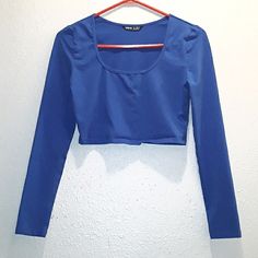 Shein. Size Medium. Long-Sleeve Crop Top. Bright Blue. Scoop Neckline. Form Fitting Material. Never Worn (Style Is Cropped Quite Short, Falls About 2 Inches Below Bust). Fitted Blue Long Sleeve Top For Spring, Blue Stretch Cotton Long Sleeve Top, Blue Cotton Stretch Long Sleeve Top, Blue Stretch Crop Top For Fall, Blue Stretch Crew Neck Long Sleeve Top, Trendy Blue Long Sleeve Top For Fall, Blue Stretch Cropped Top, Blue Fitted Long Sleeve Top, Blue Scoop Neck Top For Fall