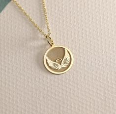 14K Real Solid Gold angel wing gold necklace ● Material of pendant: Solid Gold 14k ( REAL GOLD ) ● Metal Stamp: 14L ( REAL GOLD ) ● The pendant is available in 6 sizes: - 14,0 mm / 0,55 inches ( Diameter ) In the photos - 15,3 mm / 0.60 inches ( Diameter ) - 16,5 mm / 0,65 inches ( Diameter ) - 19,1 mm / 0,75 inches ( Diameter ) - 21 mm / 0,82 inches ( Diameter ) - 23 mm / 0.90 inches ( Diameter ) ( In the photos the size is 14mm / 0.55 inches Diameter ) ( Jump Ring inner diameter: 4 mm ) ● Mate Wings Jewelry, Angel Wings Necklace, Angel Wings Jewelry, Wings Pendant, Wings Necklace, Gold Angel Wings, Wing Jewelry, Angel Wing Necklace, Gold Angel