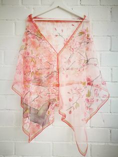 Luxury Hand painted Silk Chiffon scarf with flowering Cherry Tree branch in Warm Pink background. Lots of white and light pink cherry blossoms and little dark pink buds flowering in a spring time. Several olive green leaves and wind blown petals... Some accents in gold. All this beauty is framed with and double olive green and darker pink boarding. Very romantic, sweet, soft and cozy. ---------------------------------------------------------------------------------------------------------------- Pink Silk Shawl For Spring, Pink Shawl Scarf For Spring, Pink Shawl Scarves For Spring, Pink Floral Print Shawl Scarf, Summer Pink Floral Print Dupatta, Elegant Pink Floral Print Dupatta, Pink Feminine Floral Print Scarves, Pink Floral Print Feminine Scarves, Spring Floral Print Pink Dupatta