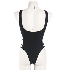 This sexy monokini features a plunging neckline with a front mesh insert, lace-up sides and an open back. You will be looking stylish in this suit at the beach or pool in this fabulous suit. Made with a polyester and spandex blend. Summer Club Bodysuit With Cutout, Summer Cutout Bodysuit For Club, Stretch Hollow Out Swimwear For Beach Season, Hollow Out Stretch Swimwear For Beachwear, High Cut Swimwear For Club And Summer, Fitted Hollow Out Swimwear For Beach Season, Stretch Hollow Out Bodysuit For Summer, One-piece Swimwear With Lace-up Back For Summer, Summer One-piece Swimwear With Lace-up Back