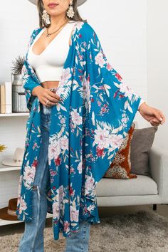 Step out in style with our Butterfly Sleeve Kimono! Available in 2 colors, it's perfect for a day out or a special evening event. Made of lightweight fabric, it'll keep you feeling cool and comfortable all night long. So why wait? Add this kimono to your wardrobe today! #lovemyleto 100% Viscose Imported Long Spring Loungewear Cover-up, Casual Spring Cover-up With Kimono Sleeves, Spring Wrap Cover-up For Loungewear, Flowy Spring Loungewear Cover-up, Spring Printed Kimono For Loungewear, Chic Floral Print Kimono For Vacation, Spring Beachwear Kimono For Brunch, Spring Long Cover-up For Loungewear, Blue V-neck Kimono For Spring