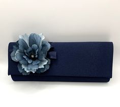 Stunning Bridal Wedding Satin Navy Blue Clutch Bag Perfect wedding accessory.   Elegant addition for those on the day essentials. Measurement  26cm x 10cm x 5cm This bag compliments our navy blue flower embellished wedding shoes and hat Blue Wedding Clutch Bag, Blue Rectangular Clutch For Wedding Guest, Blue Clutch Bag For Wedding Guest, Blue Clutch Bag For Wedding, Blue Elegant Clutch For Wedding Guest, Elegant Blue Clutch For Wedding Guest, Blue Wedding Clutch Evening Bag, Blue Rectangular Evening Bag For Wedding, Blue Rectangular Evening Bag For Wedding Guest