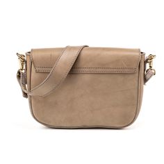 This women's shoulder bag combines style and functionality, perfect for every occasions. The modern design is enriched by a brass swivel lock, which adds a touch of elegance, allowing you to keep your personal belongings safe. The shoulder strap ensures optimal comfort, fitting perfectly around it. This bag is the ideal accessory to complete every outfit with style. Made with Vegetable Tanned Leather  Fashion Design for every kind of Elegance Vegetable Tanned Leather Luxury Everyday Crossbody Saddle Bag, Luxury Crossbody Saddle Bag For Everyday, Elegant Travel Satchel With Brass Hardware, Chic Satchel With Brass Hardware For Travel, Chic Travel Satchel With Brass Hardware, Crossbody Bags With Brass Hardware, Office Crossbody Bag With Brass Hardware, Timeless Beige Bags With Metal Hardware, Timeless Travel Satchel With Metal Hardware