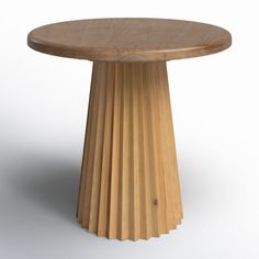 a round wooden table on a white background