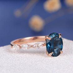 London Blue Topaz Engagement Ring Rose Gold Marquise Moissanite Eternity Oval Cut Wedding Bridal Unique Antique Promise Anniversary Women ITEM INFORMATION: Metal Type: Solid 14K Rose Gold Band Width: 2mm Size: US3-10 Center Stone: 7*9mm London Blue Topaz Side Stone: Moissanite London Blue Topaz Engagement Ring, Morganite Engagement Ring Oval, Nontraditional Engagement Rings, Rose Gold Morganite Ring, Blue Topaz Engagement Ring, Silver Wrap Ring, Engagement Ring Rose Gold, Topaz Engagement Ring, Engagement Ring Shapes