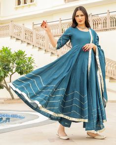 This 3 Pc anarkali Suit set is designed in mul-mul cotton fabric with Gota work mul-mul Dupatta. Kurta Length - 50, Mul-mul Cotton, Gota work With on hem & sleeves. Pant length - 38, Mul-mul cotton. Dupatta - Mul-mul cotton, gota work on edges. Fabric - mul-mul cotton. Color - Bottle Green CARE: dry clean only. Shipping - 10-12 working days. DISCLAIMER - The color of the product may be differ from the image 10-12% due to camera and lights and screen settings of device. Simple Kurti, Mood Designer Fabrics, Lace Dress Design, Fancy Suit, Gota Work, Cotton Dupatta, Anarkali Suit, Pant Length, Home Dress