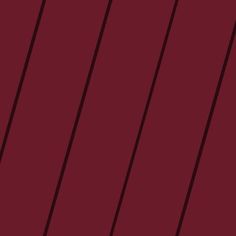 a dark red background with vertical lines