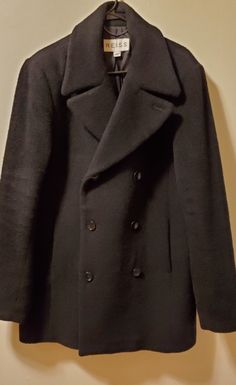 Reiss Textured Wool Teddy Coat. Double Breasted W/ Two Exterior Pockets. Textured Wool Give Coat A "Teddy Bear" Feel. Fully Lined With One Interior Breast Pocket. 100% Wool Exterior, Lining Is Polyster. Great Condition. A Rare Find!! Fits Size 42 Chest. Designer Black Pea Coat With Double Button Closure, Designer Black Wool Pea Coat, Designer Black Pea Coat With Button Closure, Designer Black Double-breasted Pea Coat, Black Double-breasted Peacoat For Business, Designer Fitted Pea Coat With Double-breasted Buttons, Black Double-breasted Peacoat For Formal Occasions, Designer Pea Coat For Business In Winter, Designer Fitted Double-breasted Pea Coat