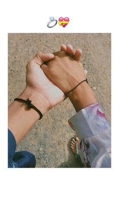 two hands holding each other with the words love on them and an image of a person's wrist