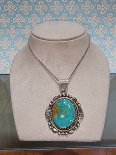 Circa 2000, handmade sterling silver Royston turquoise pendant. Marked sterling and signed "B Lee". Measures approx. 61 x 43mm. Weighs 21.7 grams. Older patina is prevalent; however, polishing can be provided prior to shipping with an extra fee, should you desire. A chain is not included. Thanks for looking. ERA - Circa 2000, Vintage METAL / MATERIAL - Sterling Silver  SIZE / MEASUREMENTS -  Measures approx. 61 x 43mm. Weighs 21.7 grams.  CONDITION - Older patina is prevalent, however polishing Western Style Collectible Turquoise Sterling Silver Necklace, Handmade Western Silver Turquoise Necklace, Southwestern Silver Turquoise Necklace With Patina, Silver Turquoise Necklace With Large Pendant, Western Style Silver Turquoise Necklace With Large Pendant, Southwestern Sterling Silver Turquoise Cabochon Necklace, Southwestern Silver Oval Turquoise Necklace, Silver Oval Turquoise Necklace Collectible, Silver Oval Turquoise Collectible Necklace