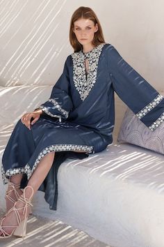 Blue chambray kaftan with white mirror embroidery on the yoke and border. - Aza Fashions Summer Blue Kurta With Embroidered Neckline, Blue Summer Kurta With Embroidered Neckline, Bohemian Kurta With Mirror Work For Spring, Bohemian Spring Kurta With Mirror Work, Spring Bohemian Kurta With Mirror Work, Bohemian Kaftan With Mirror Work, Bohemian Tunic Dress With Mirror Work, Blue Chikankari Embroidered Kaftan For Summer, Blue Chikankari Embroidery Kaftan For Summer