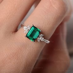 ◆ Featuring the dainty Emerald in the shape of emerald, clear cubic zirconia like the angel wings appear on the sides of the champagne gemstone. A piece fits for elegance, suitable for engagement, party, daily occasion. ◆ Production Description: Main stone Type: Lab Emerald Main Stone Shape: Emerald Main Stone Size: 6*8mm Side stone: CZ Metal: 925 Sterling silver - Other options available in the drop down menu ◆ Customization: √Free for Add Engraving √Other Metal Type Available √Other Gemstones Dazzling Emerald Ring With Diamond Accents As Gift, Fine Jewelry Emerald Crystal Ring With Accent Stones, Cubic Zirconia Emerald Cut Birthstone Ring, Elegant Emerald Crystal Ring In Emerald Cut, Dazzling Emerald Cut Crystal Ring Gift, Elegant Emerald Crystal Ring With Accent Stones, Dazzling Emerald-cut Crystal Ring Gift, Emerald Birthstone Ring With Diamond Accents As Gift, Emerald Cut Emerald Crystal Ring In White Gold